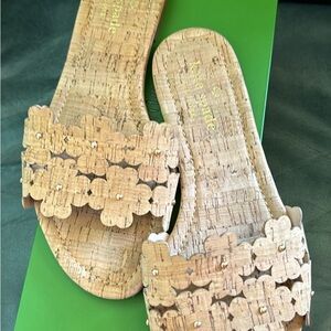 These natural cork Kate Spade Sandals are in excellent used condition.